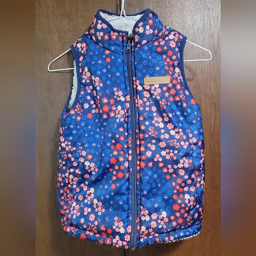 Reversable vest. Kids size 7/8, dark blue background inside grey fleece.